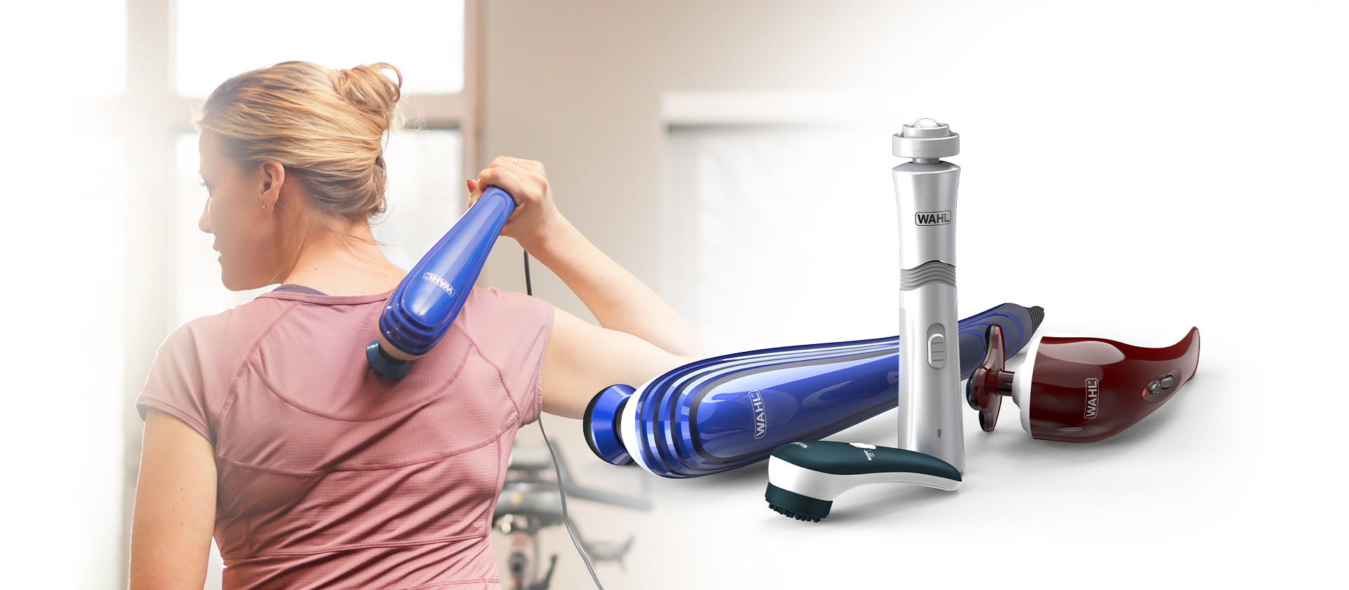 lady using a deep tissue massager on her shoulder