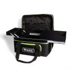 Green and black tool carry fully open